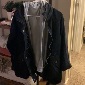 Black jean jacket with grey hoodie